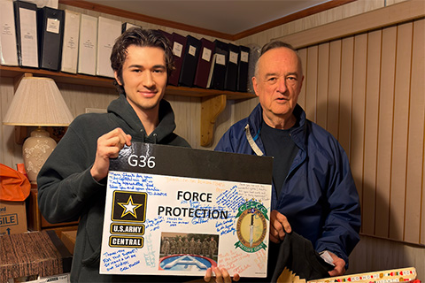 Fisher pharmacy student with volunteer during the annual Service Day.