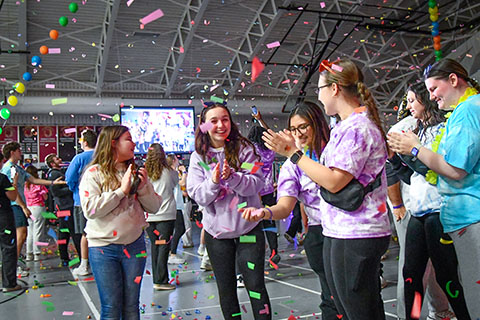 Students celebrate with confetti