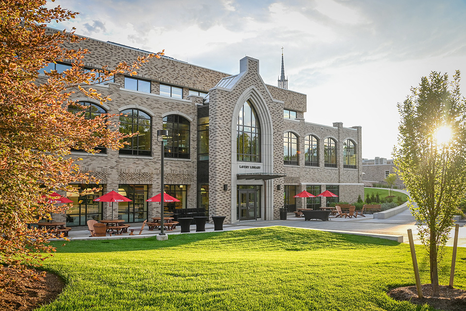 Lavery Library with iconic Kearney Hall and sunset as a backdrop.