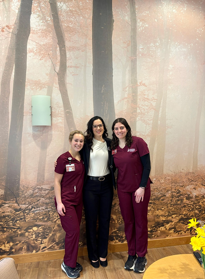 Gabriella Lawrence and Brynn Calvert with Dr. Joy Hogan.
