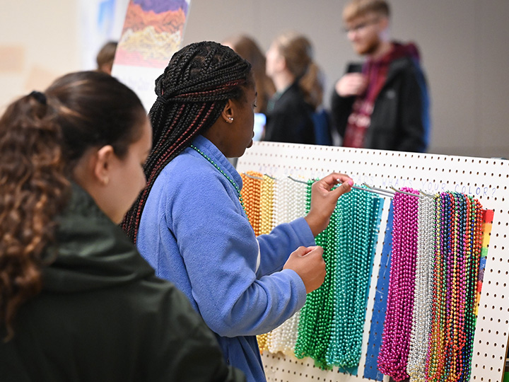 Walk participants select Honor Beads to acknowledge the reason they participate in the Out of the Darkness Walk to end suicide.