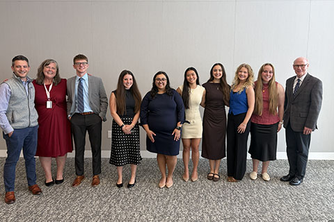Students posing at a stop during Fisher Flight