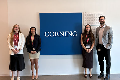 Students and alumni at the Corning headquarters during the Fisher Flight