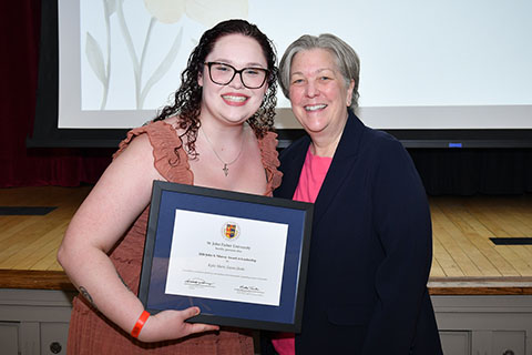 A female student award winner and Dr. Matha Thornton