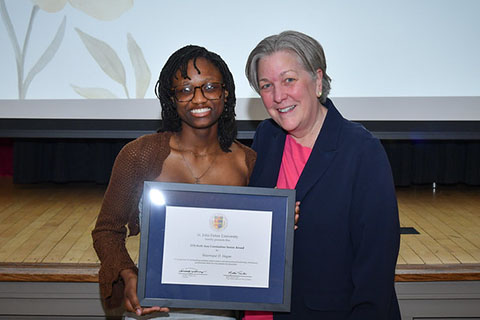 A female student award winner and Dr. Matha Thornton