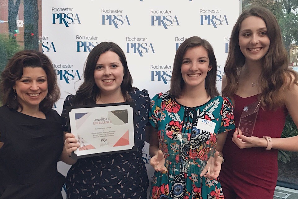 Professor Arien Rozelle with Fisher students Lindsey Garrant, Collen Senglaub, and Alyssa Whitley.