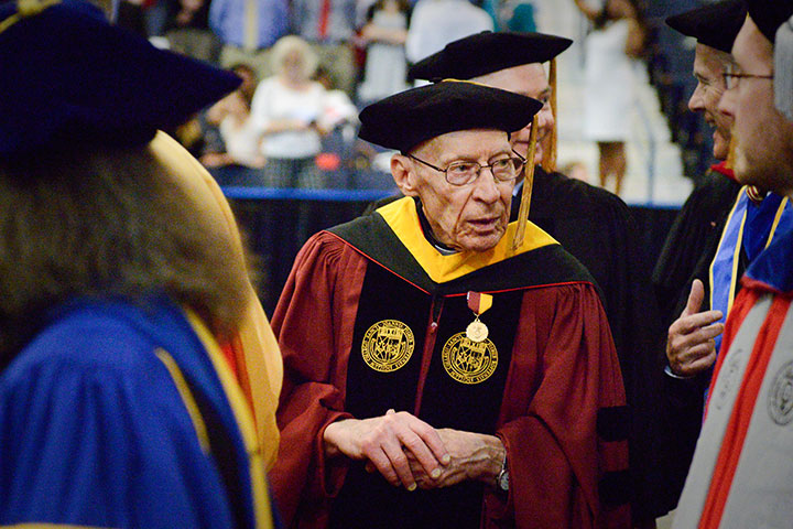 Fr. Al Cylwicki at the College's 2016 Commencement Ceremony, where he was given the President’s Medal for Service to St. John Fisher College. 