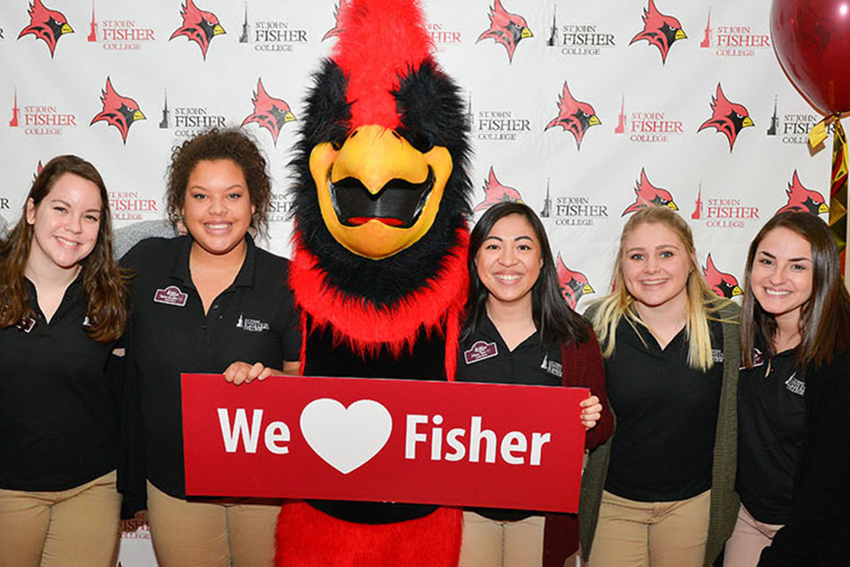 A group of students celebrate their love for Fisher.
