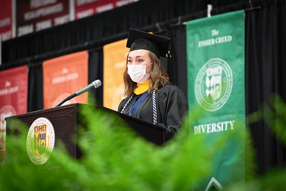 Molly Taylor addresses her fellow graduates at the School of Arts and Sciences morning Commencement ceremony.