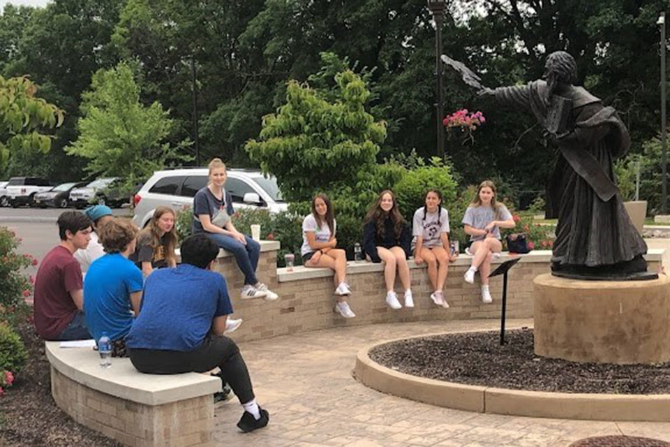 Students at the GDK Summer Student Leadership Conference talk outside of the Hermance Family Chapel of St. Basil the Great.