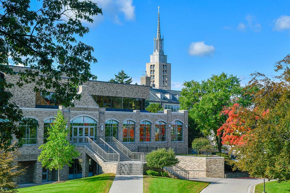 Lavery Library in the fall with the Kearney Steeple in background view.