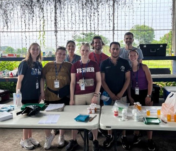 A team of students and faculy from Fisher at a health clinic in Guatemala.