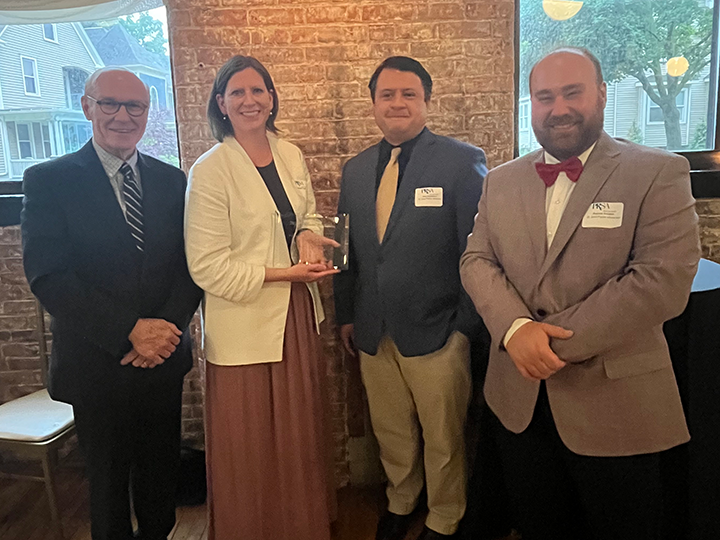 Members of the Fisher Marketing and Communications team stand with Dr. Gerard Rooney at the 2023 PRism Awards