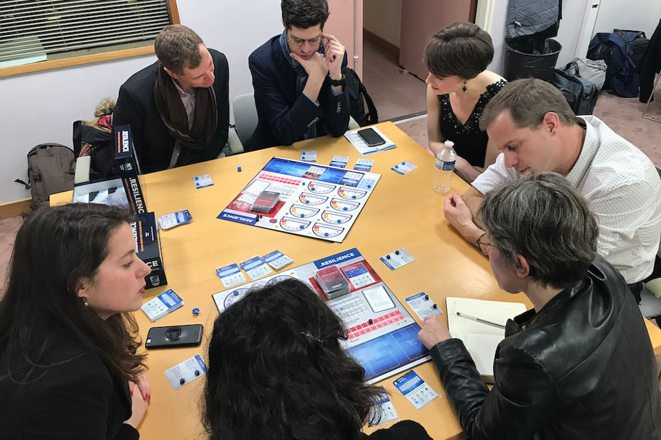 Conference attendees play a game.