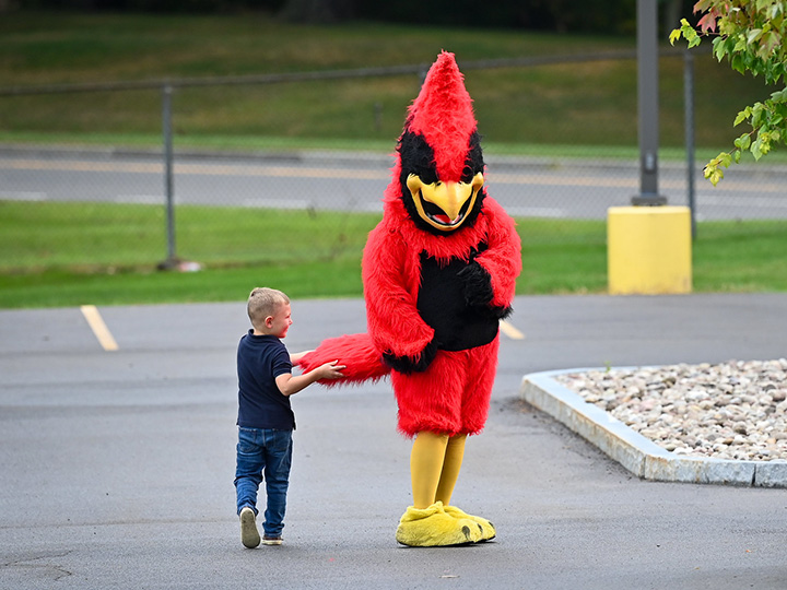 Be like this kid following Beaks, and follow us to the new location for this webpage.