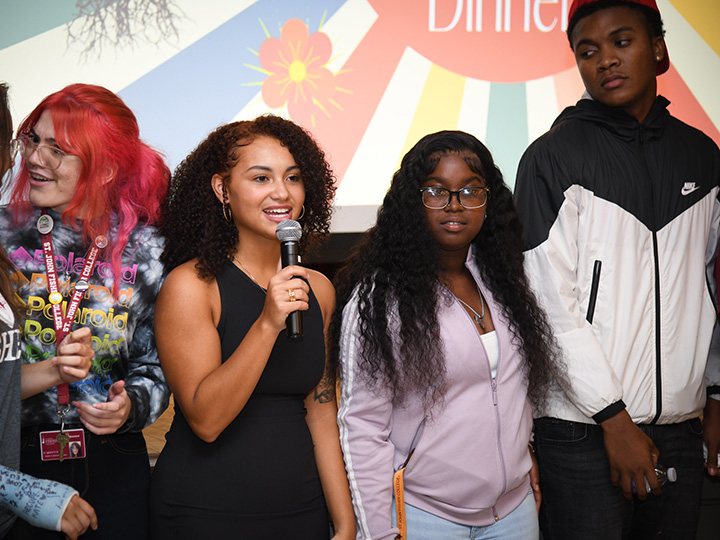 Students speak at the Inclusion Dinner.