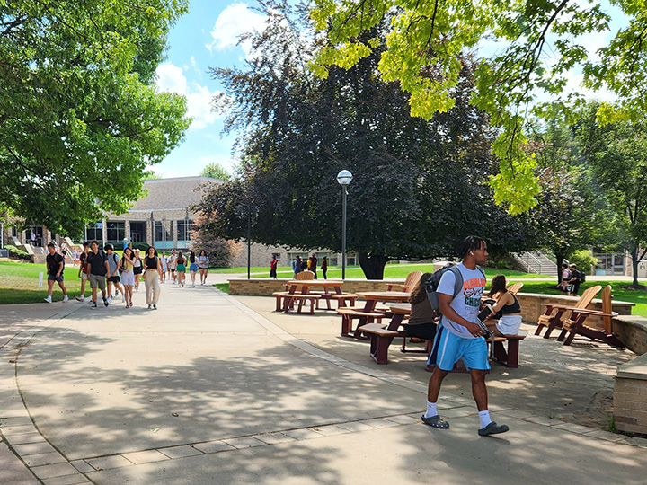 Students walk through LeChase Commons on their way to class