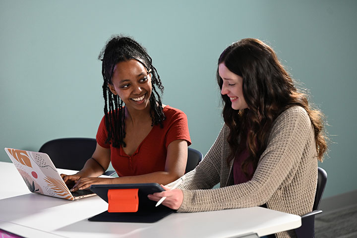 Two students working together.