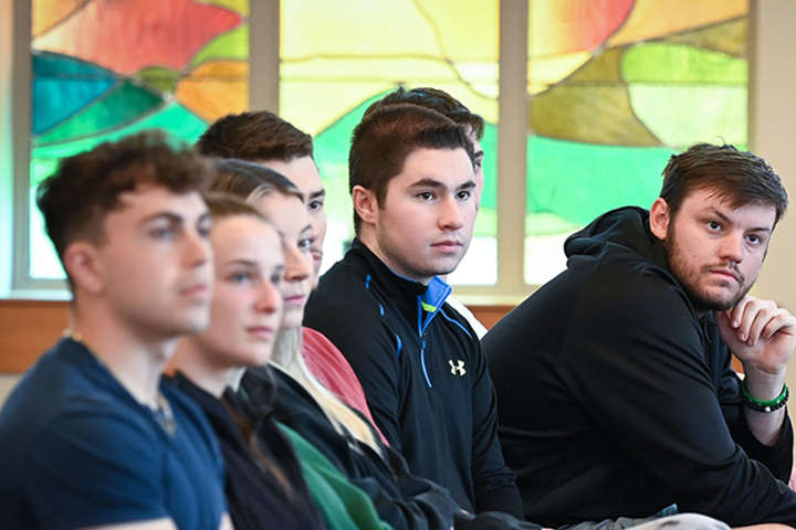 Students sitting in the Hermance Family Chapel of St. Basil the Great.