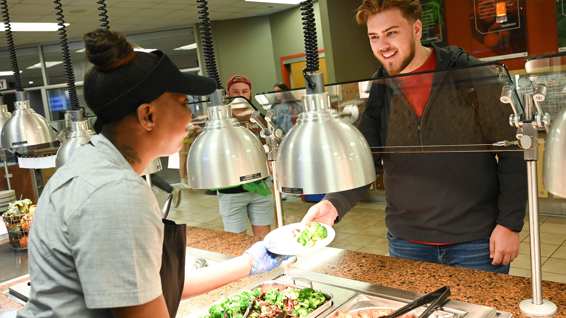 A student selects his meal in the Ward-Haffey Dining Hall.