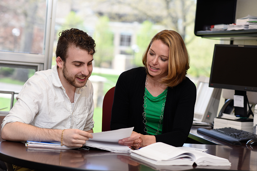 Student talking with career readiness coach