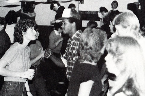 1985 students dancing together