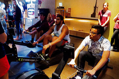 2015 students on rowing machines at a challenge event