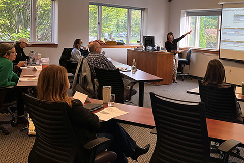 People participate in a professional development seminar.
