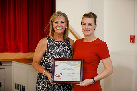 Sara Crouser receives the Rising Star award.