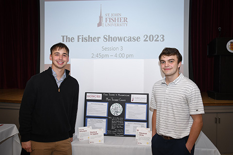 Students share their research at the Fisher Showcase.
