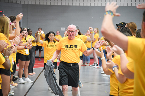 President Rooney being greeted by Orientation Team.