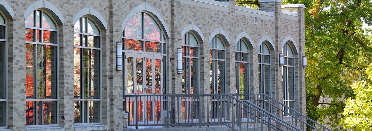 Fall colors reflecting off library windows.