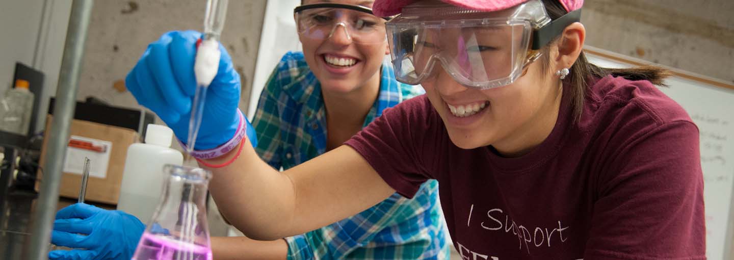 Students learning in a science lab.