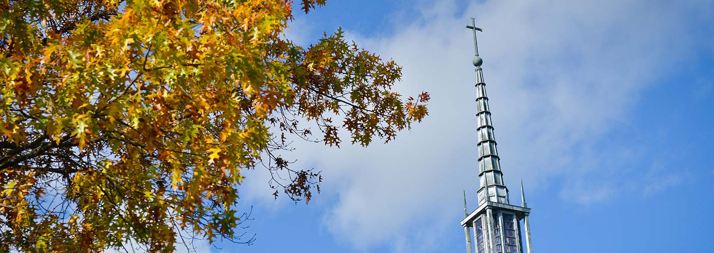 Kearney Hall steeple and fall foliage