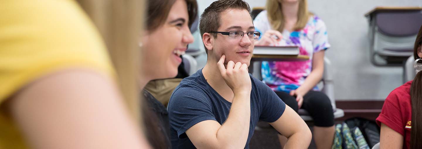 Student looking pensive in classroom