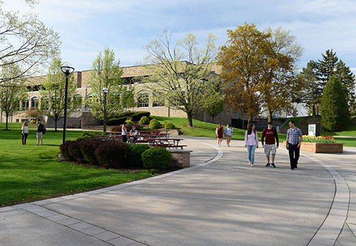 Students walking along LeChase Commons.