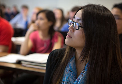 Side view of a student in pharmacy class.