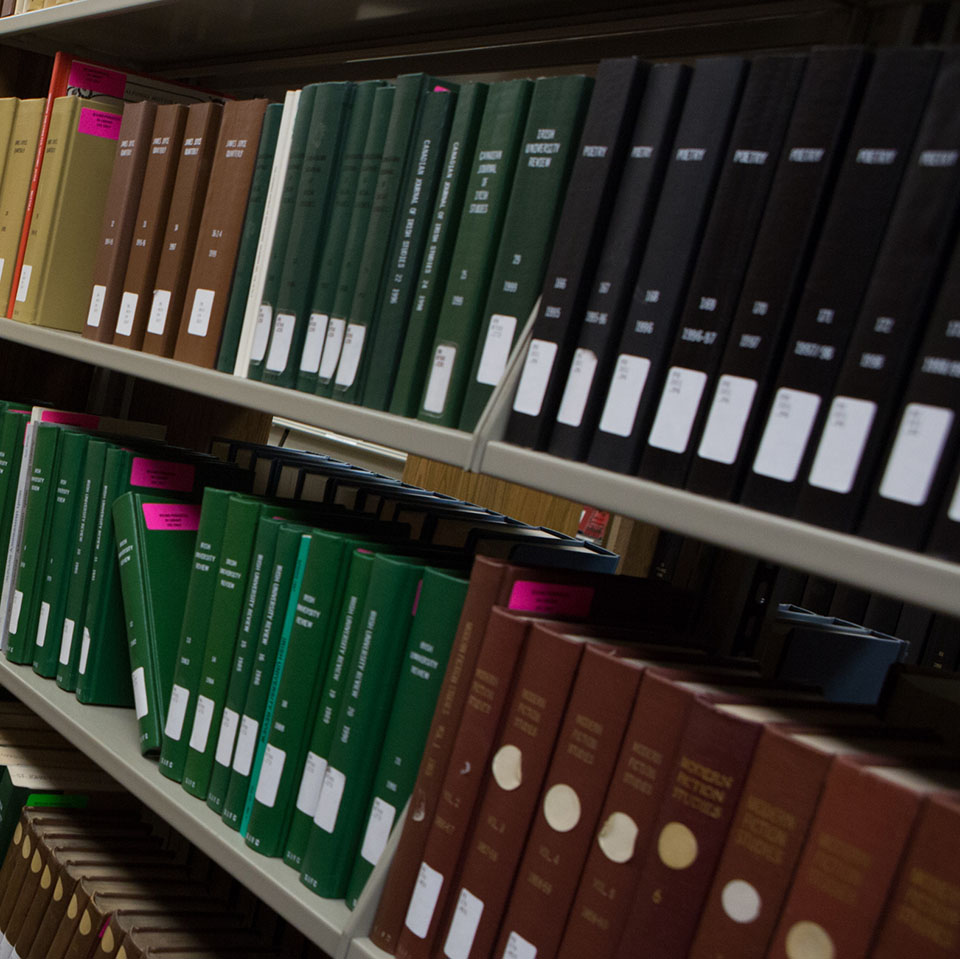 Shelves of scholarly research resources and books in the Lavery Library.