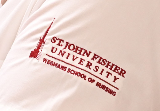 St. John Fisher University's Wegmans School of Nursing uniform.