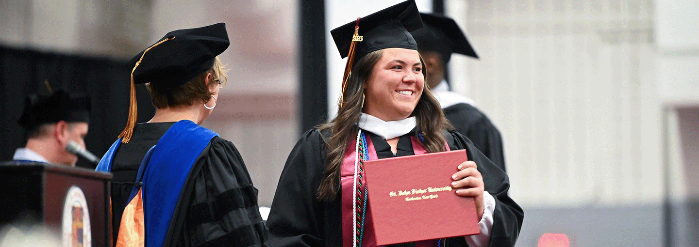 Students celebrate their achievements at Fisher Commencement.